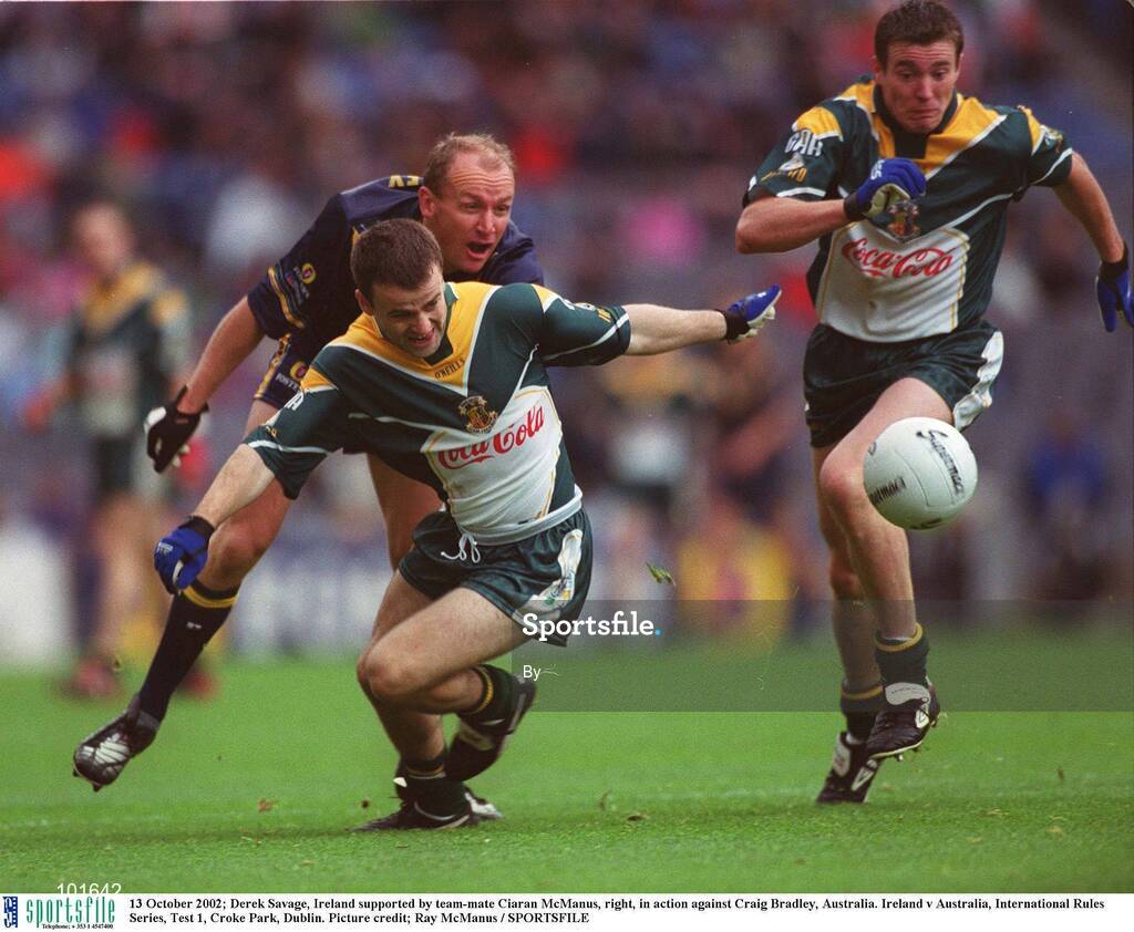 13 October 2002; Derek Savage, Ireland supported by team-mate Ciaran McManus, right, in action against Craig Bradley, Australia. Ireland v Australia, International Rules Series, Test 1, Croke Park, Dublin. Picture credit; Ray McManus / SPORTSFILE