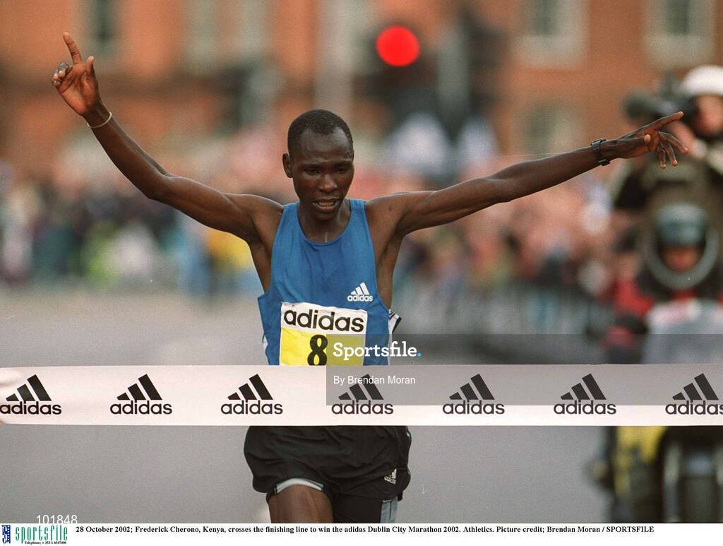 28 October 2002; Frederick Cherono, Kenya, crosses the finishing line to win the adidas Dublin City Marathon 2002. Athletics. Picture credit; Brendan Moran / SPORTSFILE