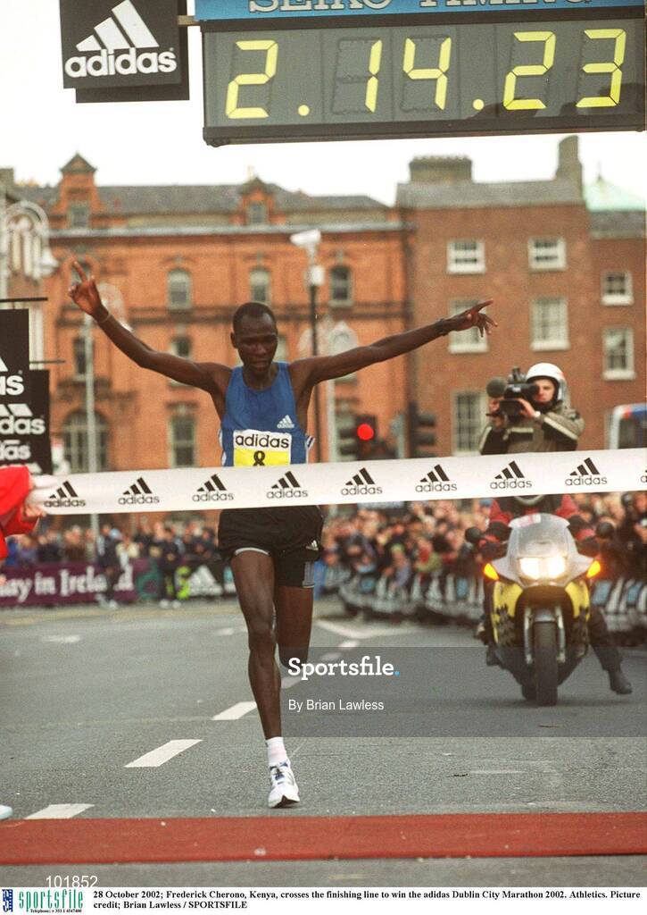 28 October 2002; Frederick Cherono, Kenya, crosses the finishing line to win the adidas Dublin City Marathon 2002. Athletics. Picture credit; Brian Lawless / SPORTSFILE