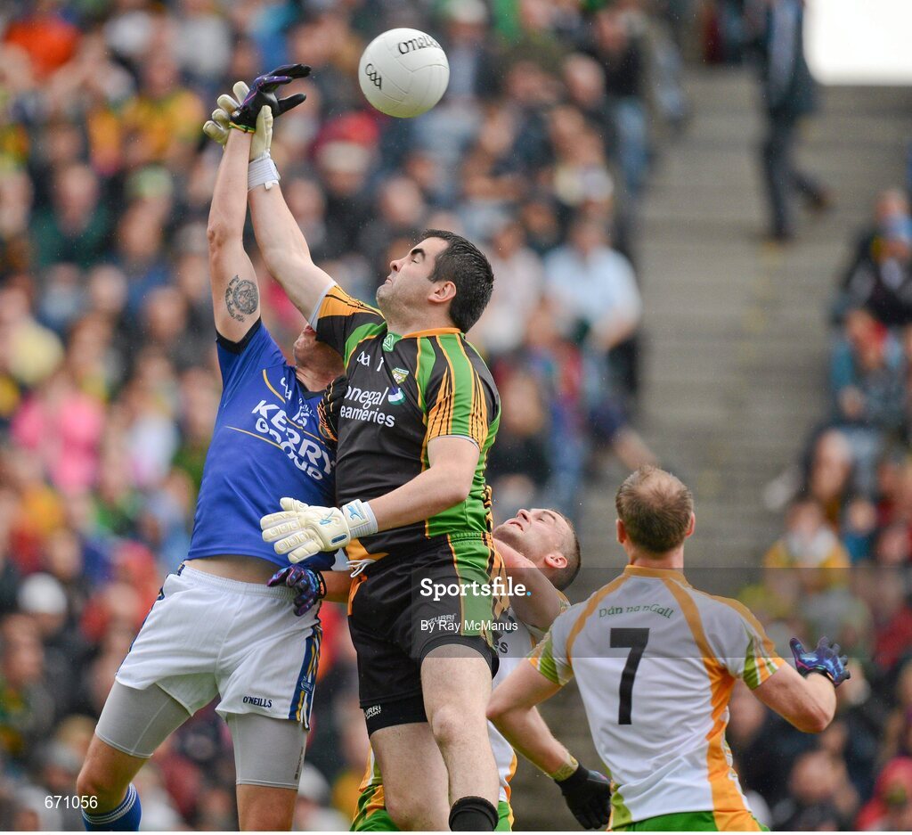 5 August 2012; Kieran Donaghy beats Donegal goalkeeper Paul Durkan and substitute Eamonn McGee to score a goal, for Kerry, in the 65th minute. GAA Football All-Ireland Senior Championship Quarter-Final, Donegal v Kerry, Croke Park, Dublin. Picture credit: Ray McManus / SPORTSFILE