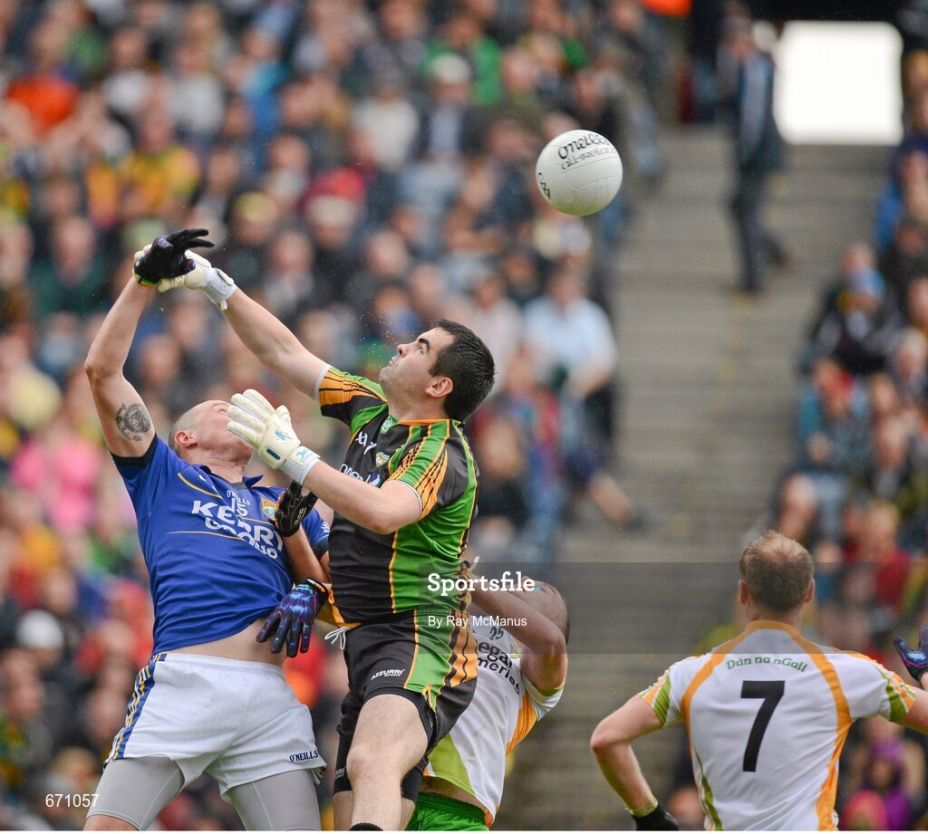 5 August 2012; Kieran Donaghy beats Donegal goalkeeper Paul Durkan and substitute Eamonn McGee to score a goal, for Kerry, in the 65th minute. GAA Football All-Ireland Senior Championship Quarter-Final, Donegal v Kerry, Croke Park, Dublin. Picture credit: Ray McManus / SPORTSFILE