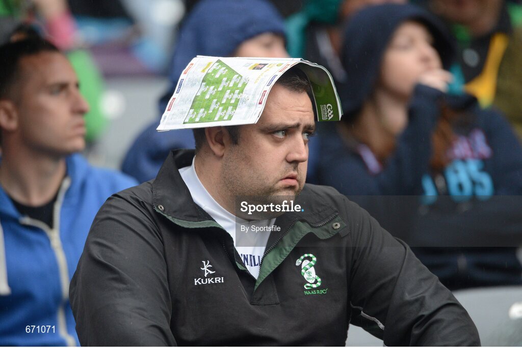 5 August 2012; A supporter takes shelter from the rain during the game. GAA Football All-Ireland Senior Championship Quarter-Final, Donegal v Kerry, Croke Park, Dublin. Photo by Sportsfile