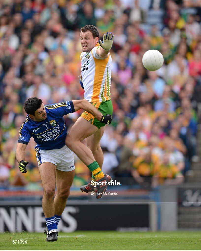 5 August 2012; Donegal captain Michael Murphy jostles with the Kerry full back Aidan O'Mahony as the ball, from Colm McFadden's line ball makes its way to the net. GAA Football All-Ireland Senior Championship Quarter-Final, Donegal v Kerry, Croke Park, Dublin. Picture credit: Ray McManus / SPORTSFILE