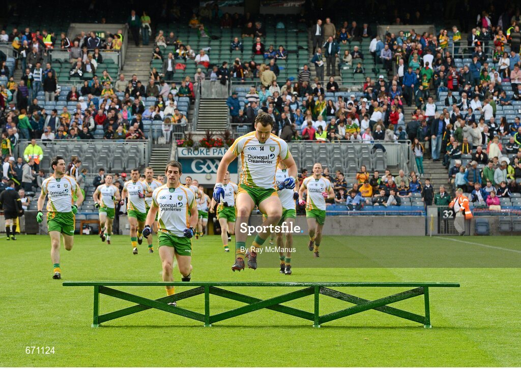 5 August 2012; The Donegal squad, lead by their captain Michael Murphy, make their way to the bench for the traditional team photograph. GAA Football All-Ireland Senior Championship Quarter-Final, Donegal v Kerry, Croke Park, Dublin. Picture credit: Ray McManus / SPORTSFILE