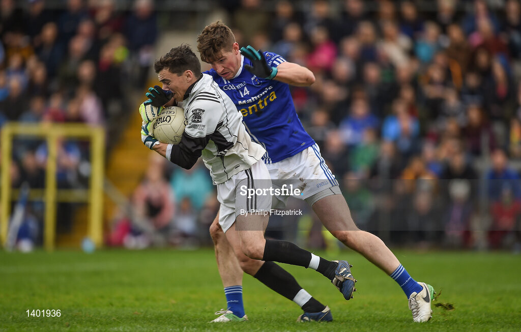 15 October 2017; David Kirk of Magheracloone in action against Darren Hughes of Scotstown during the Monaghan County Senior Football Championship Final match between Magheracloone and Scotstown at St Tiernach's Park in Monaghan. Photo by Philip Fitzpatrick/Sportsfile