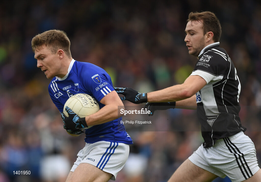 15 October 2017; Conor McCarthy of Scotstown in action against Paul McArdle of Magheracloone during the Monaghan County Senior Football Championship Final match between Magheracloone and Scotstown at St Tiernach's Park in Monaghan. Photo by Philip Fitzpatrick/Sportsfile