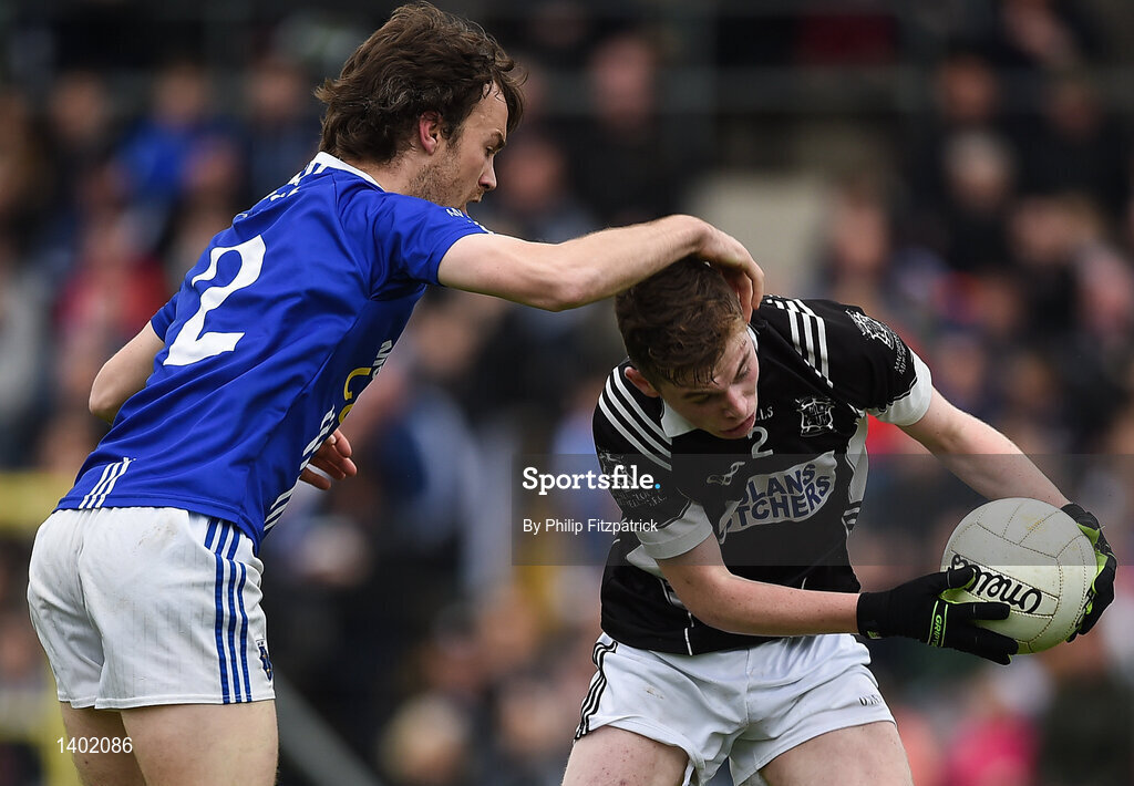 15 October 2017; Paul McArdle of Magheracloone in action against Fergal McPhillips of Scotstown, during the Monaghan County Senior Football Championship Final match between Magheracloone and Scotstown at St Tiernach's Park in Monaghan. Photo by Philip Fitzpatrick/Sportsfile