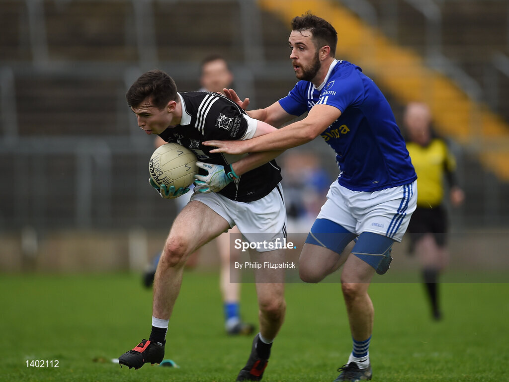15 October 2017; Allan Kieran of Magheracloone in action against Emmet Caulfield of Scotstown, during the Monaghan County Senior Football Championship Final match between Magheracloone and Scotstown at St Tiernach's Park in Monaghan. Photo by Philip Fitzpatrick/Sportsfile