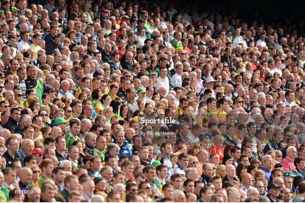 5 August 2012; Supporters of both teams, in the Cusack Stand, stand and sing the National Anthem. GAA Football All-Ireland Senior Championship Quarter-Final, Donegal v Kerry, Croke Park, Dublin. Picture credit: Ray McManus / SPORTSFILE