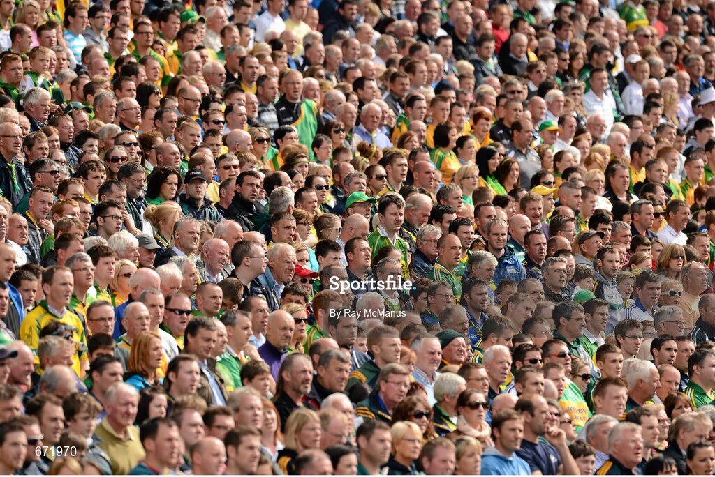 5 August 2012; Supporters of both teams, in the Cusack Stand, stand and sing the National Anthem. GAA Football All-Ireland Senior Championship Quarter-Final, Donegal v Kerry, Croke Park, Dublin. Picture credit: Ray McManus / SPORTSFILE