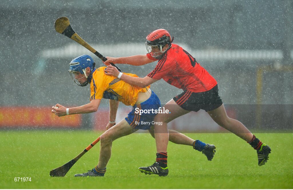 28 July 2012; Bobby Duggan, Clare, in action against Caolan Taggart, Down. Electric Ireland GAA Hurling Minor Championship Quarter-Final, Down v Clare, Cusack Park, Mullingar, Co. Westmeath. Picture credit: Barry Cregg / SPORTSFILE
