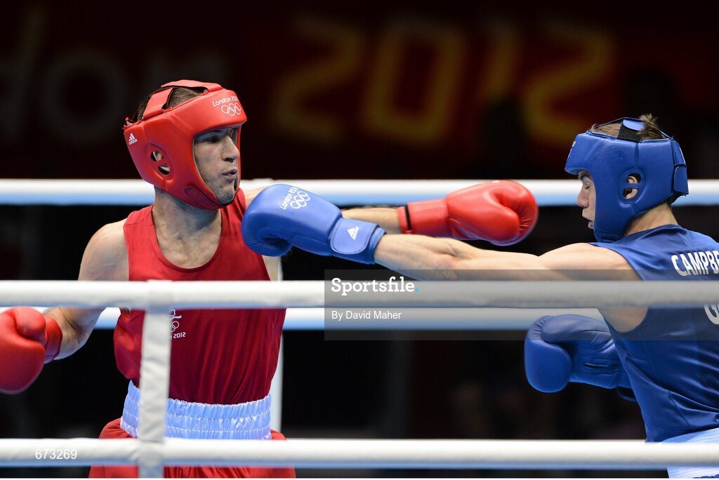 11 August 2012; John Joe Nevin, Ireland, left, exchanges punches with Luke Campbell, Great Britain, during their men's bantam 56kg final contest. London 2012 Olympic Games, Boxing, South Arena 2, ExCeL Arena, Royal Victoria Dock, London, England. Picture credit: David Maher / SPORTSFILE