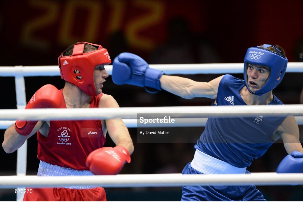 11 August 2012; John Joe Nevin, Ireland, left, exchanges punches with Luke Campbell, Great Britain, during their men's bantam 56kg final contest. London 2012 Olympic Games, Boxing, South Arena 2, ExCeL Arena, Royal Victoria Dock, London, England. Picture credit: David Maher / SPORTSFILE