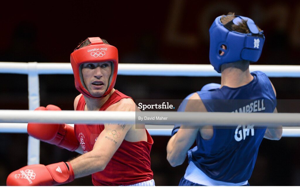 11 August 2012; John Joe Nevin, Ireland, left, exchanges punches with Luke Campbell, Great Britain, during their men's bantam 56kg final contest. London 2012 Olympic Games, Boxing, South Arena 2, ExCeL Arena, Royal Victoria Dock, London, England. Picture credit: David Maher / SPORTSFILE