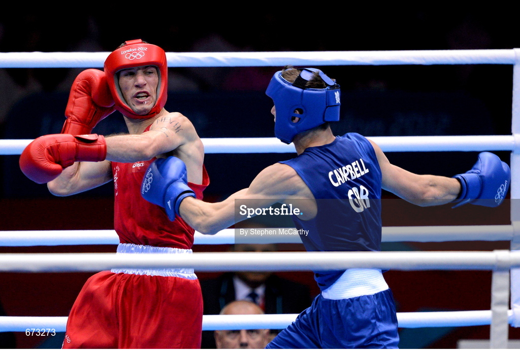 11 August 2012; John Joe Nevin, Ireland, left, exchanges punches with Luke Campbell, Great Britain, during their men's bantam 56kg final contest. London 2012 Olympic Games, Boxing, South Arena 2, ExCeL Arena, Royal Victoria Dock, London, England. Picture credit: Stephen McCarthy / SPORTSFILE