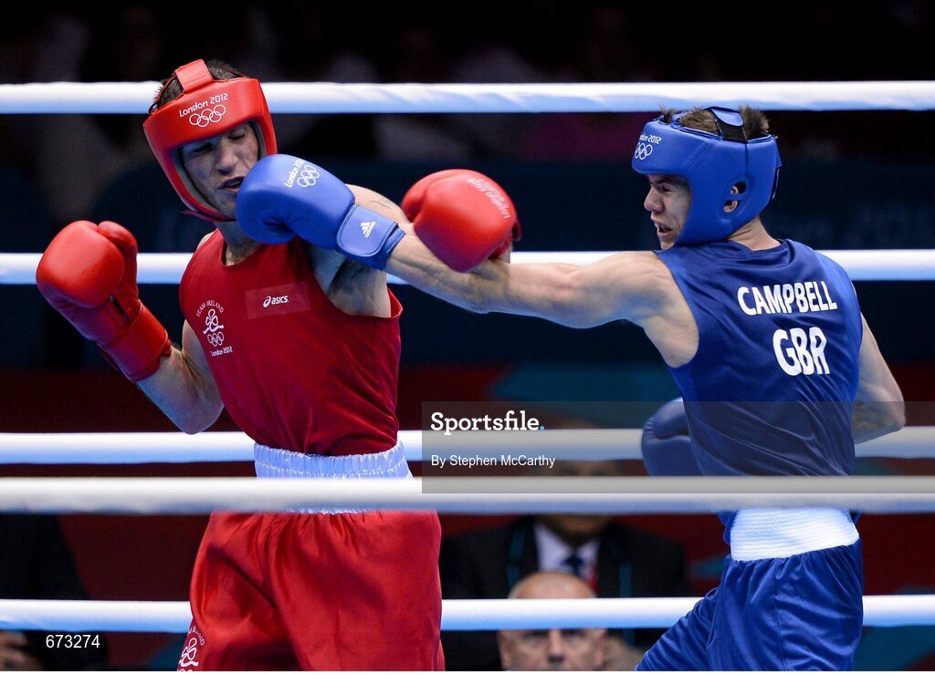 11 August 2012; John Joe Nevin, Ireland, left, exchanges punches with Luke Campbell, Great Britain, during their men's bantam 56kg final contest. London 2012 Olympic Games, Boxing, South Arena 2, ExCeL Arena, Royal Victoria Dock, London, England. Picture credit: Stephen McCarthy / SPORTSFILE