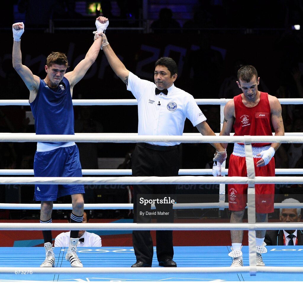 11 August 2012; John Joe Nevin, Ireland, reacts as Luke Campbell, Great Britain, is declared the winner at the end of their men's bantam 56kg final contest. London 2012 Olympic Games, Boxing, South Arena 2, ExCeL Arena, Royal Victoria Dock, London, England. Picture credit: David Maher / SPORTSFILE
