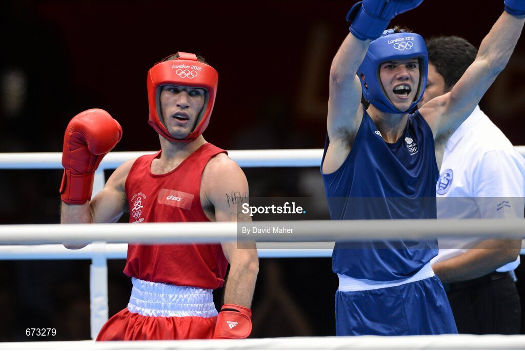 11 August 2012; John Joe Nevin, Ireland, and Luke Campbell, Great Britain, react after their men's bantam 56kg final contest. London 2012 Olympic Games, Boxing, South Arena 2, ExCeL Arena, Royal Victoria Dock, London, England. Picture credit: David Maher / SPORTSFILE