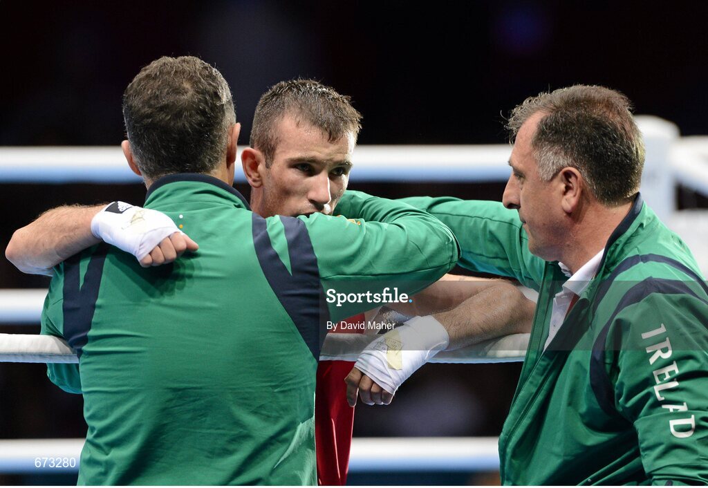 11 August 2012; John Joe Nevin, Ireland, is consoled by Team Ireland boxing head coach Billy Walsh, left, and Team Ireland boxing technical & tactical head coach Zaur Anita after his men's bantam 56kg final contest. London 2012 Olympic Games, Boxing, South Arena 2, ExCeL Arena, Royal Victoria Dock, London, England. Picture credit: David Maher / SPORTSFILE