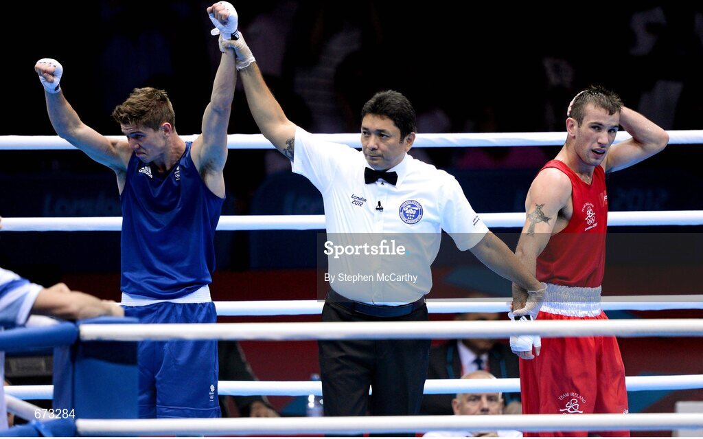 11 August 2012; John Joe Nevin, Ireland, reacts as Luke Campbell, Great Britain, is declared the winner at the end of their men's bantam 56kg final contest. London 2012 Olympic Games, Boxing, South Arena 2, ExCeL Arena, Royal Victoria Dock, London, England. Picture credit: Stephen McCarthy / SPORTSFILE