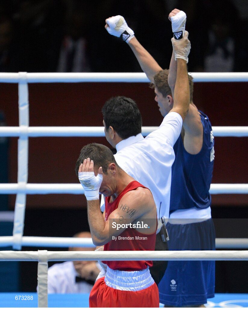11 August 2012; John Joe Nevin, Ireland, reacts as Luke Campbell, Great Britain, is declared the winner at the end of their men's bantam 56kg final contest. London 2012 Olympic Games, Boxing, South Arena 2, ExCeL Arena, Royal Victoria Dock, London, England. Picture credit: Brendan Moran / SPORTSFILE