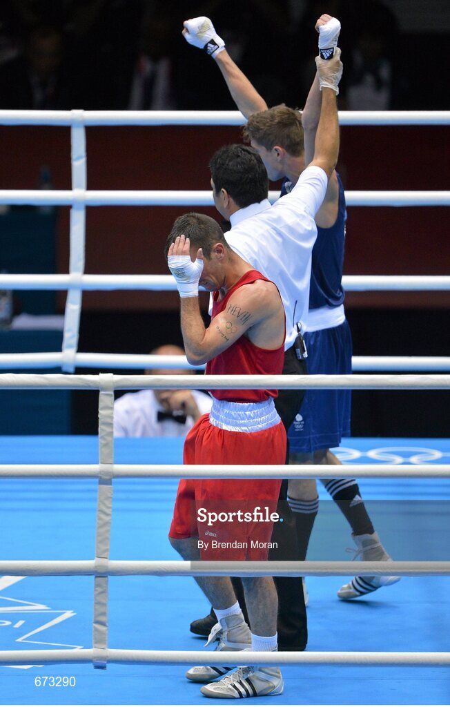 11 August 2012; John Joe Nevin, Ireland, reacts as Luke Campbell, Great Britain, is declared the winner at the end of their men's bantam 56kg final contest. London 2012 Olympic Games, Boxing, South Arena 2, ExCeL Arena, Royal Victoria Dock, London, England. Picture credit: Brendan Moran / SPORTSFILE