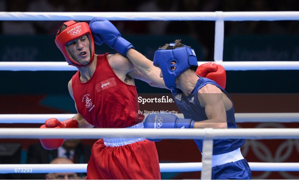 11 August 2012; John Joe Nevin, Ireland, left, exchanges punches with Luke Campbell, Great Britain, during their men's bantam 56kg final contest. London 2012 Olympic Games, Boxing, South Arena 2, ExCeL Arena, Royal Victoria Dock, London, England. Picture credit: Stephen McCarthy / SPORTSFILE