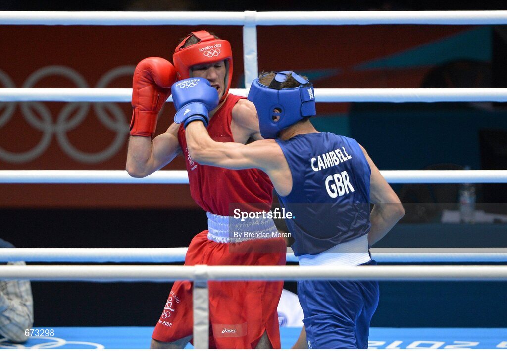 11 August 2012; John Joe Nevin, Ireland, left, exchanges punches with Luke Campbell, Great Britain, during their men's bantam 56kg final contest. London 2012 Olympic Games, Boxing, South Arena 2, ExCeL Arena, Royal Victoria Dock, London, England. Picture credit: Brendan Moran / SPORTSFILE