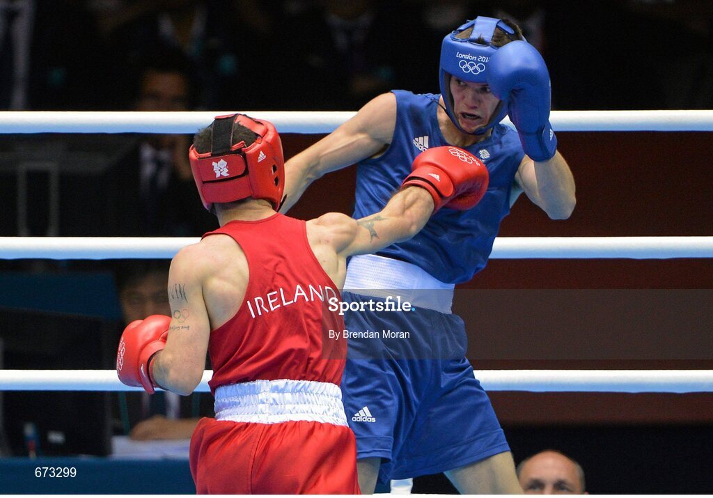 11 August 2012; John Joe Nevin, Ireland, left, exchanges punches with Luke Campbell, Great Britain, during their men's bantam 56kg final contest. London 2012 Olympic Games, Boxing, South Arena 2, ExCeL Arena, Royal Victoria Dock, London, England. Picture credit: Brendan Moran / SPORTSFILE