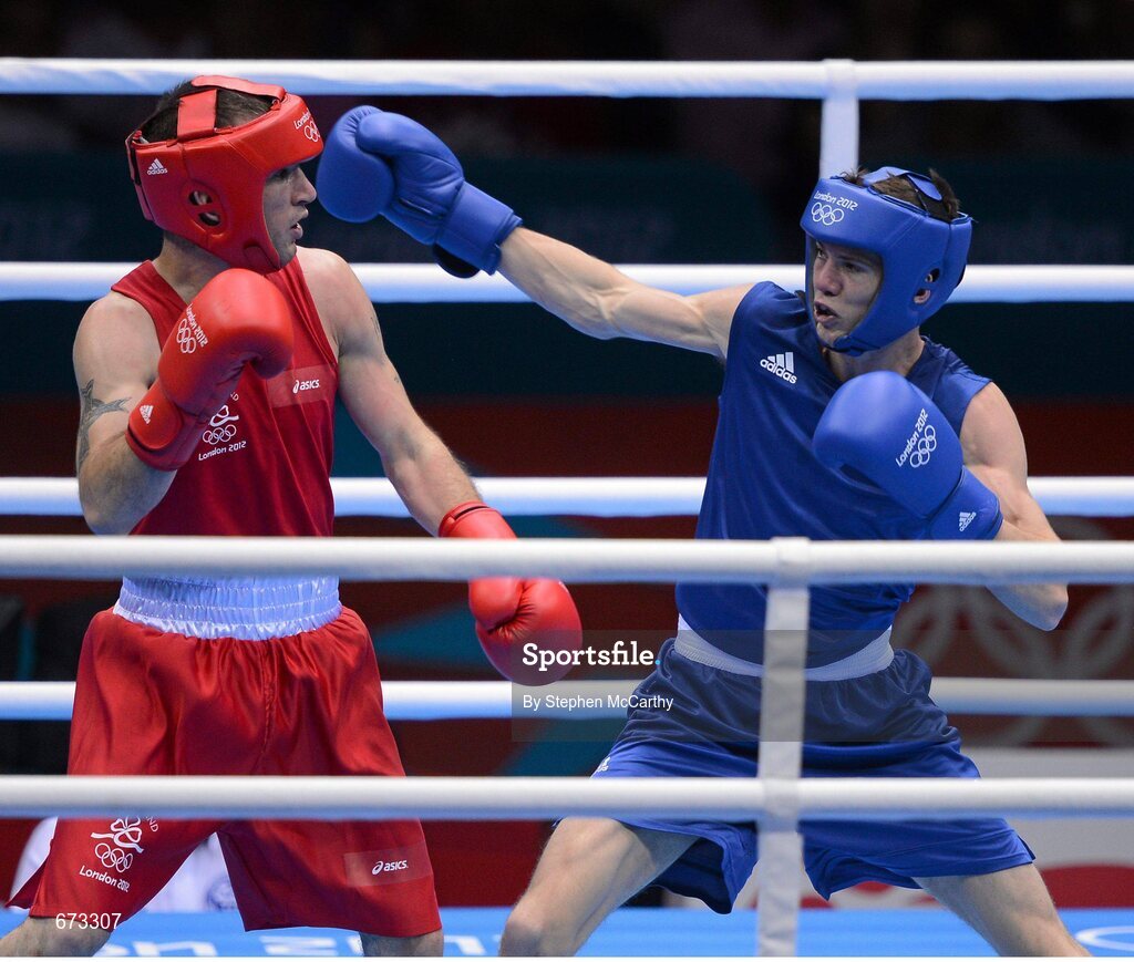 11 August 2012; John Joe Nevin, Ireland, left, exchanges punches with Luke Campbell, Great Britain, during their men's bantam 56kg final contest. London 2012 Olympic Games, Boxing, South Arena 2, ExCeL Arena, Royal Victoria Dock, London, England. Picture credit: Stephen McCarthy / SPORTSFILE
