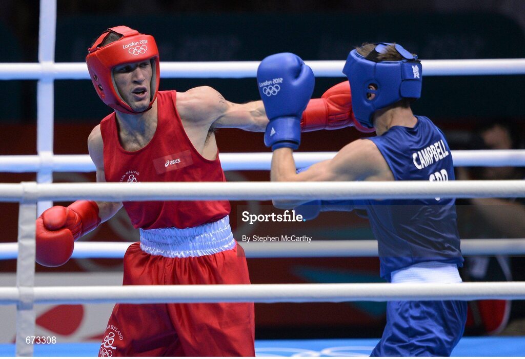 11 August 2012; John Joe Nevin, Ireland, left, exchanges punches with Luke Campbell, Great Britain, during their men's bantam 56kg final contest. London 2012 Olympic Games, Boxing, South Arena 2, ExCeL Arena, Royal Victoria Dock, London, England. Picture credit: Stephen McCarthy / SPORTSFILE