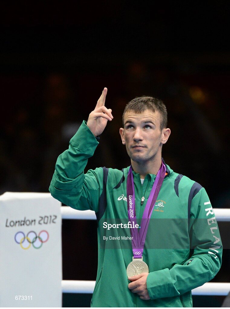 11 August 2012; Team Ireland's John Joe Nevin, men's bantam 56kg, looks to the sky after being presented with his Olympic silver medal. London 2012 Olympic Games, Boxing, South Arena 2, ExCeL Arena, Royal Victoria Dock, London, England. Picture credit: David Maher / SPORTSFILE