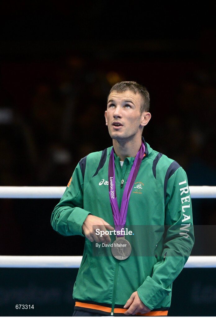 11 August 2012; Team Ireland's John Joe Nevin, men's bantam 56kg, looks to the sky after being presented with his Olympic silver medal. London 2012 Olympic Games, Boxing, South Arena 2, ExCeL Arena, Royal Victoria Dock, London, England. Picture credit: David Maher / SPORTSFILE
