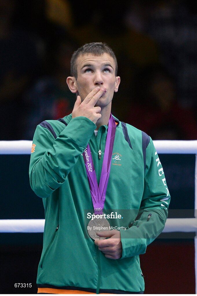 11 August 2012; Team Ireland's John Joe Nevin, men's bantam 56kg, looks to the sky after being presented with his Olympic silver medal. London 2012 Olympic Games, Boxing, South Arena 2, ExCeL Arena, Royal Victoria Dock, London, England. Picture credit: Stephen McCarthy / SPORTSFILE