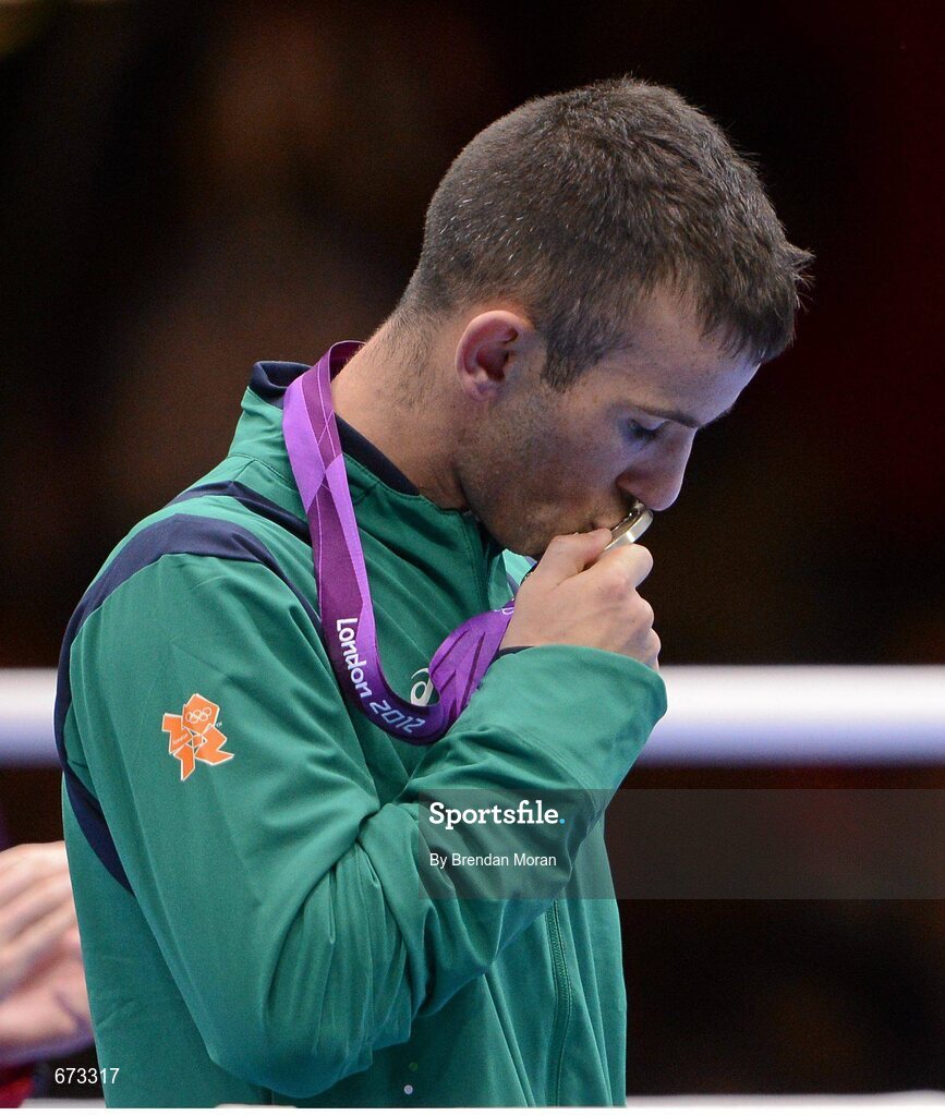 11 August 2012; Team Ireland's John Joe Nevin, men's bantam 56kg, kisses his Olympic silver medal. London 2012 Olympic Games, Boxing, South Arena 2, ExCeL Arena, Royal Victoria Dock, London, England. Picture credit: Brendan Moran / SPORTSFILE