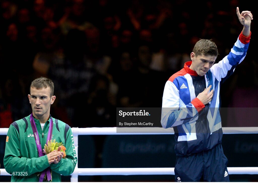 11 August 2012; Team Ireland's John Joe Nevin applauds as Great Britain's Luke Campbell is announced as the men's bantam 56kg Olympic Champion. London 2012 Olympic Games, Boxing, South Arena 2, ExCeL Arena, Royal Victoria Dock, London, England. Picture credit: Stephen McCarthy / SPORTSFILE
