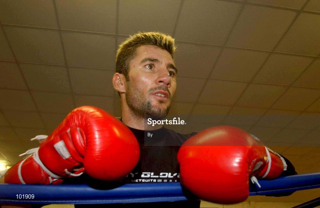 23 October 2002; Wayne McCullough takes a break during training at the Sandy Row Boxing Club, Belfast, Northern Ireland. Picture credit; David Maher / SPORTSFILE *EDI*
