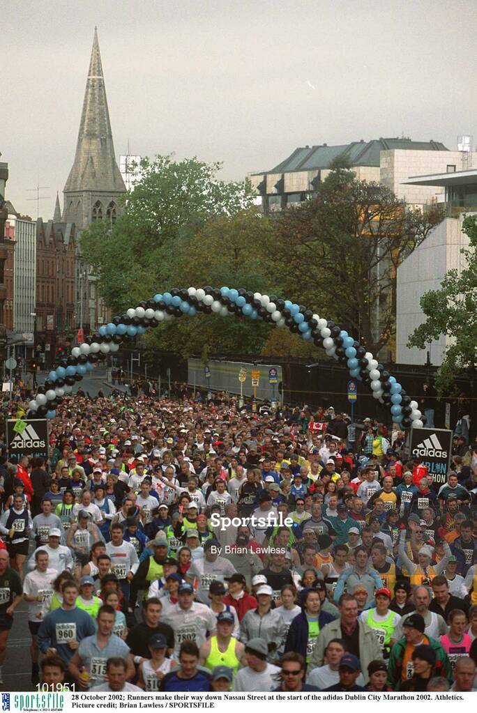 28 October 2002; Runners make their way down Nassau Street at the start of the adidas Dublin City Marathon 2002. Athletics. Picture credit; Brian Lawless / SPORTSFILE
