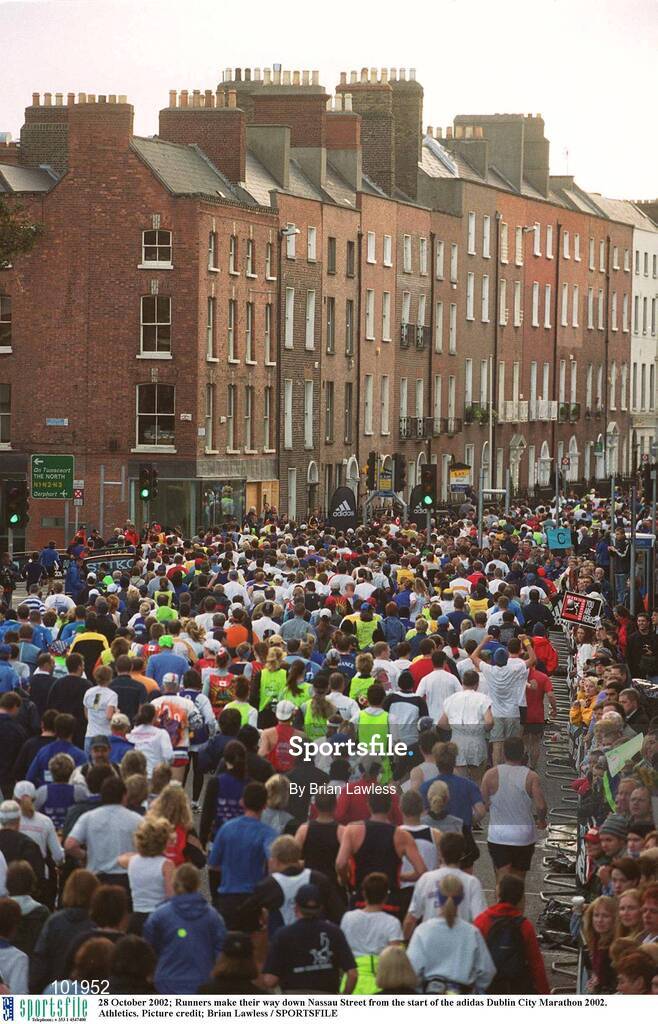 28 October 2002; Runners make their way down Nassau Street from the start of the adidas Dublin City Marathon 2002. Athletics. Picture credit; Brian Lawless / SPORTSFILE