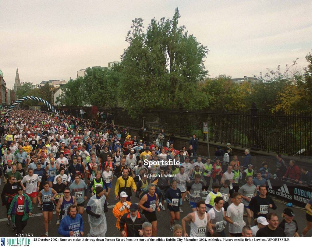 28 October 2002; Runners make their way down Nassau Street from the start of the adidas Dublin City Marathon 2002. Athletics. Picture credit; Brian Lawless / SPORTSFILE