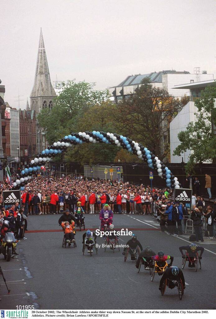 28 October 2002; The Wheelchair Athletes make their way down Nassau St. at the start of the adidas Dublin City Marathon 2002. Athletics. Picture credit; Brian Lawless / SPORTSFILE