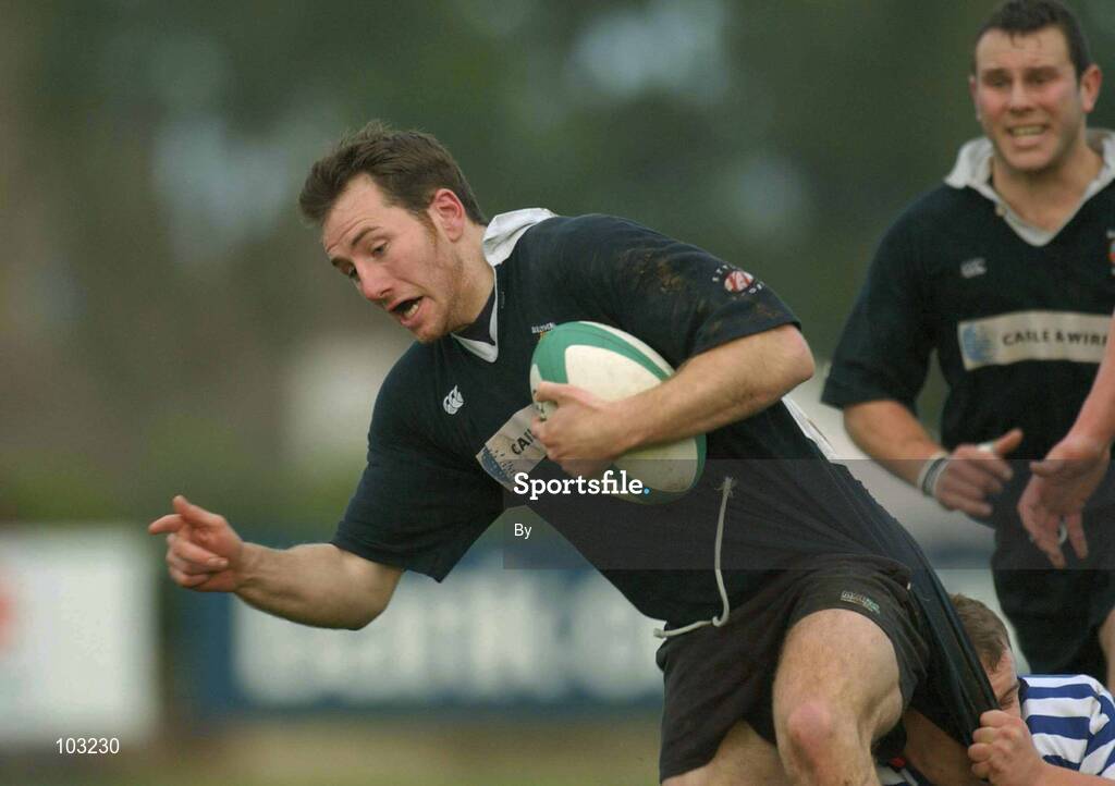 30 November 2002; Hayde Swift, Ballymena, is tackled by Emmet Farrell, Blackrock. Blackrock College v Ballymena, AIB League, Division One, Stradbrook Road, Dublin. Rugby. Picture credit; Matt Browne / SPORTSFILE *EDI*