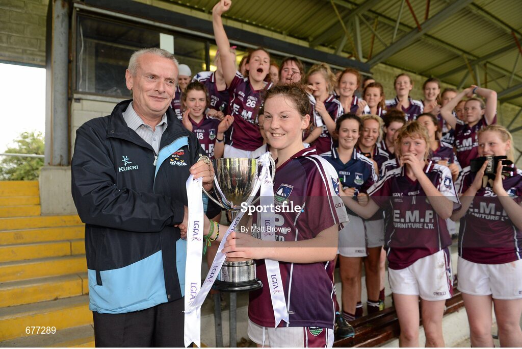 25 August 2012; Brian Enright, President of the Munster Ladies Gaelic Football Association, presents the cup to Galway captain Eimile Gavin. All Ireland U16 ‘A’ Championship Final, Cork v Galway, MacDonagh Park, Nenagh, Co. Tipperary. Picture credit: Matt Browne / SPORTSFILE
