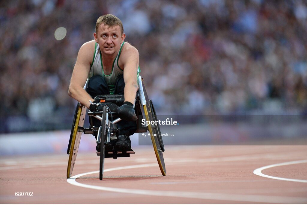 3 September 2012; Ireland's John McCarthy, from Dunmanway, Co. Cork, checks his time after the men's 100m - T51 final. London 2012 Paralympic Games, Athletics, Olympic Stadium, Olympic Park, Stratford, London, England. Picture credit: Brian Lawless / SPORTSFILE