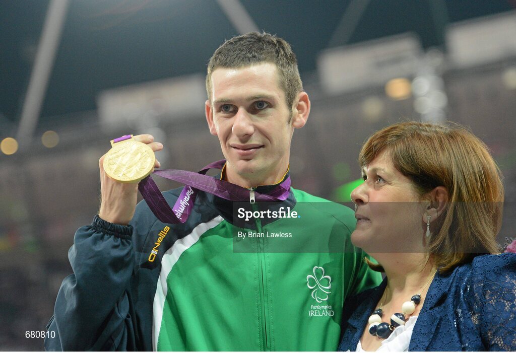 3 September 2012; Ireland's Michael McKillop, from Newtownabbey, Co. Antrim, who was presented with his gold medal by his mother Catherine after winning the men's 1500m - T37 final in a time of 4.08:11. London 2012 Paralympic Games, Athletics, Olympic Stadium, Olympic Park, Stratford, London, England. Picture credit: Brian Lawless / SPORTSFILE