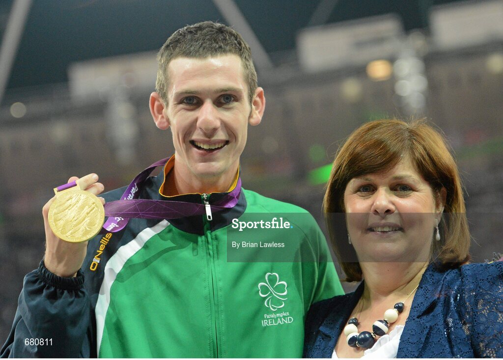3 September 2012; Ireland's Michael McKillop, from Newtownabbey, Co. Antrim, who was presented with his gold medal by his mother Catherine after winning the men's 1500m - T37 final in a time of 4.08:11. London 2012 Paralympic Games, Athletics, Olympic Stadium, Olympic Park, Stratford, London, England. Picture credit: Brian Lawless / SPORTSFILE