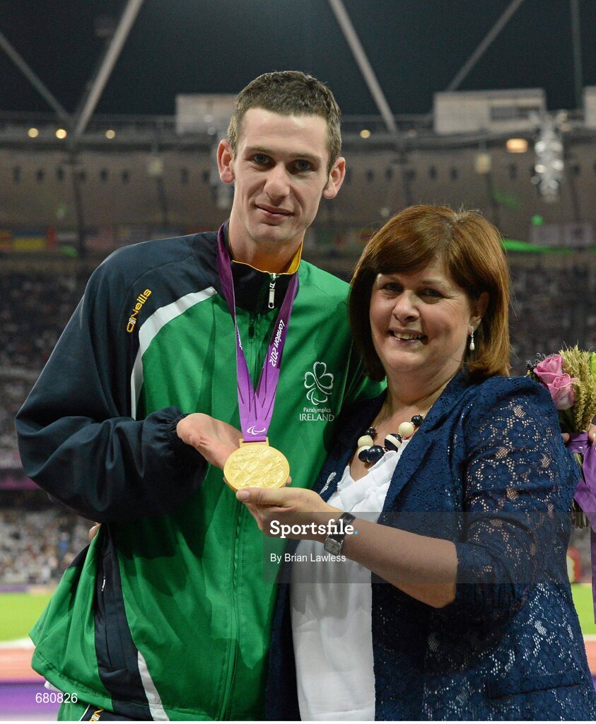 3 September 2012; Ireland's Michael McKillop, from Newtownabbey, Co. Antrim, who was presented with his gold medal by his mother Catherine after winning the men's 1500m - T37 final in a time of 4.08:11. London 2012 Paralympic Games, Athletics, Olympic Stadium, Olympic Park, Stratford, London, England. Picture credit: Brian Lawless / SPORTSFILE