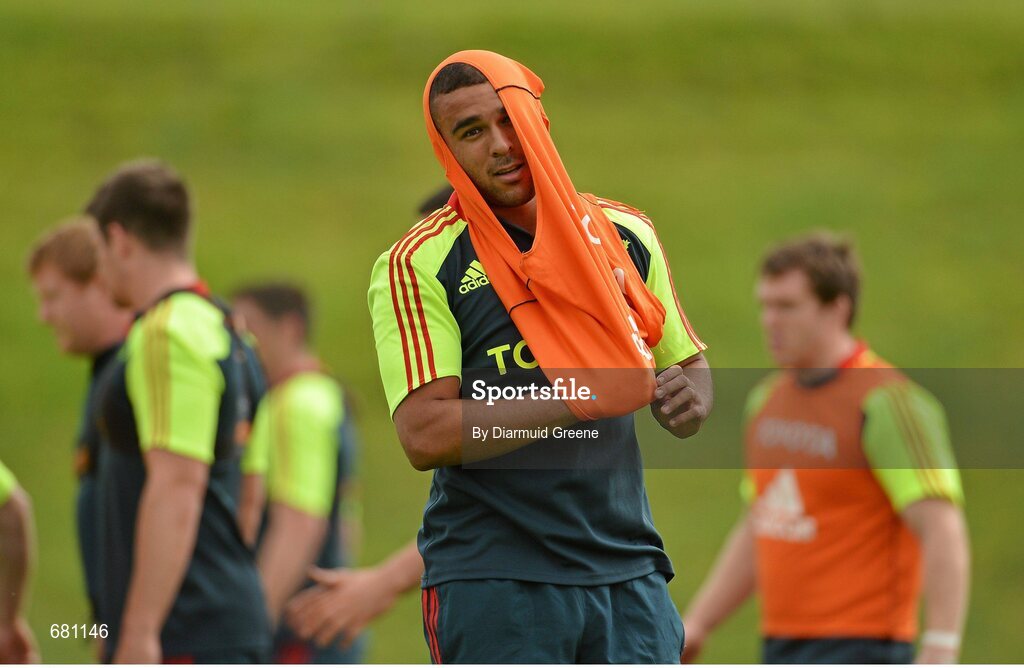 5 September 2012; Munster's Simon Zebo puts on a bib during squad training ahead of their Celtic League, Round 2, match against Benetton Treviso on Friday. Munster Rugby Squad Training, University of Limerick, Limerick. Picture credit: Diarmuid Greene / SPORTSFILE