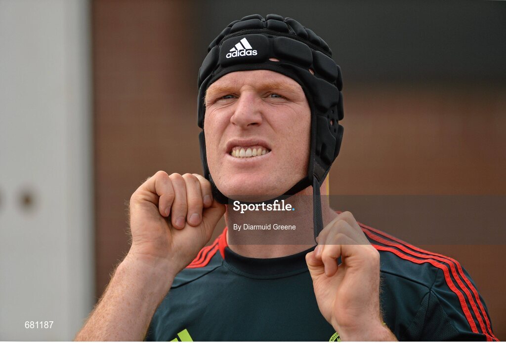 5 September 2012; Munster's Paul O'Connell tries on a new scrum cap during squad training ahead of their Celtic League, Round 2, match against Benetton Treviso on Friday. Munster Rugby Squad Training, University of Limerick, Limerick. Picture credit: Diarmuid Greene / SPORTSFILE