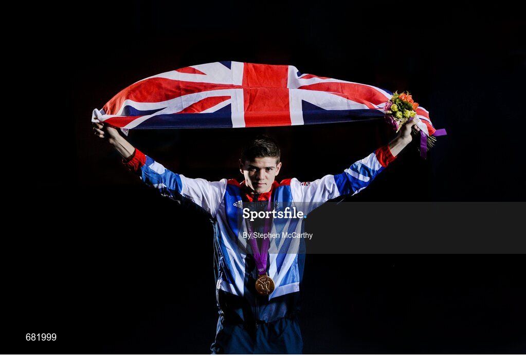 11 August 2012; Great Britain's Luke Campbell celebrates after being presented with his men's bantam 56kg Olympic gold medal. London 2012 Olympic Games, Boxing, South Arena 2, ExCeL Arena, Royal Victoria Dock, London, England. Picture credit: Stephen McCarthy / SPORTSFILE